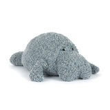 Plush toy hippo with textured surface on a white background