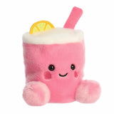 Plush toy resembling a pink drink with a lemon slice and straw on a white background