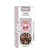 Bibs studio collection packaging with two colorful baby teething rings on a white background