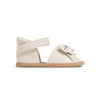 White sandal with a bow on a white background