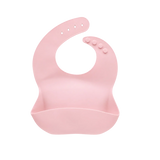 A light pink silicone baby bib with a wide front tray and suction cup details on the neck strap, shown on a plain white background.