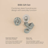 BIBS pacifier set with pacifier clip on a beige background