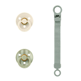 Two baby pacifiers with straps on a white background