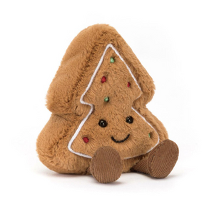 Plush gingerbread tree toy with a smiley face on a white background