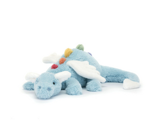 Blue plush toy with colorful accents on a white background