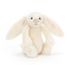 Cream-colored plush bunny toy on a white background