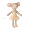 Stuffed mouse toy in a yellow dress with a tutu on a white background