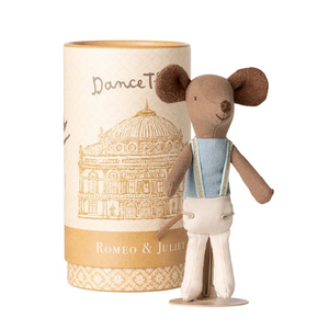 Stuffed mouse toy in a 'Romeo & Juliet' costume next to a cylindrical packaging with 'Dance Theatre of Harlem' design.