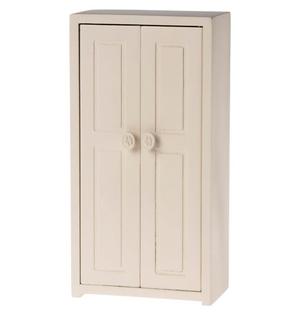 Beige storage cabinet with two doors on a white background