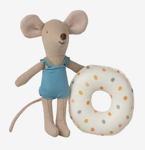 Stuffed mouse toy with a polka dot ring on a white background