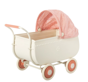 Toy pram with a pink hood on a white background