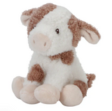 Plush cow toy with brown spots on a white background
