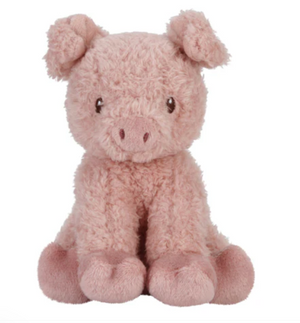 Pink plush pig toy on a white background