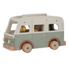 Wooden toy van with a white roof on a white background