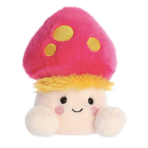 Plush toy with a pink mushroom cap and smiling face on a white background