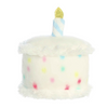 Plush toy shaped like a birthday cake with colorful candles on a white background