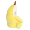 Yellow plush toy resembling a duck on a white background