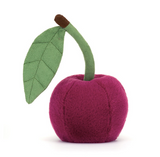 Felted pink apple with a green leaf on a white background