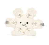 White plush toy with snowflake patterns on a white background