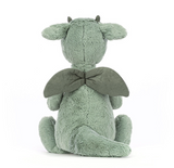 Green plush dragon toy on a white background
