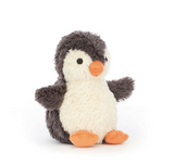 Stuffed penguin toy on a white background