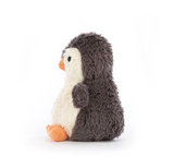 Stuffed penguin toy on a white background