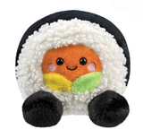Plush toy resembling a piece of sushi with a smiling face on a white background