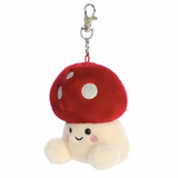 Plush mushroom keychain with a red cap and white body on a white background