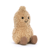 Plush toy shaped like a peanut with a smiling face on a white background