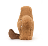 Brown plush animal toy on a white background