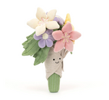 Plush toy resembling a bouquet of flowers with a smiling face on a white background