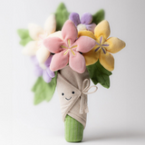 Toy flower bouquet with a smiling face on a white background