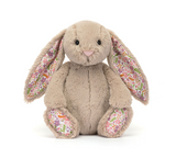 Plush bunny toy with floral ears and feet on a white background