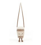 Knitted bag with a face on a white background