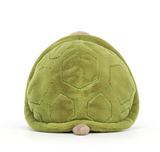 Green plush turtle shell toy on a white background