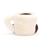 White plush toy resembling a coffee cup with brown accents on a white background