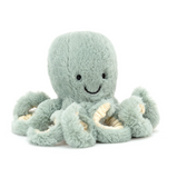 Plush octopus toy with a smiling face on a white background