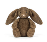 Brown plush bunny toy on a white background