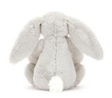 Fluffy gray bunny plush toy on a white background