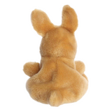 Back view of a plush dog toy on a white background