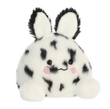 Plush toy with black and white pattern on a white background