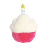 Plush toy shaped like a cupcake with a birthday candle on a white background