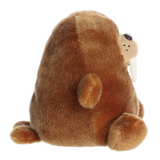 Plush walrus toy on a white background