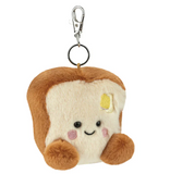 Plush keychain shaped like a slice of bread with a face on a white background