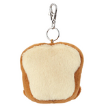 Plush bread keychain with a metal clasp on a white background