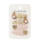Set of decorative hair clips on a Rockahula branded card
