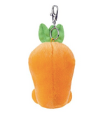 Plush carrot keychain with green leaves on a white background