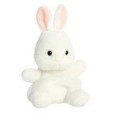 White plush bunny toy with pink ears on a white background