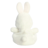 White rabbit-shaped object on a white background