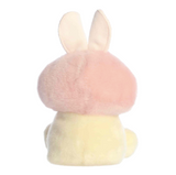 Pastel-colored mushroom-shaped object with a bunny-like top on a white background